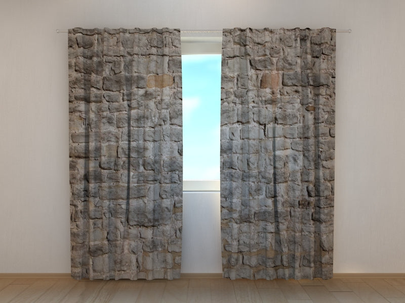 Mur de briques de château de rideau de photo