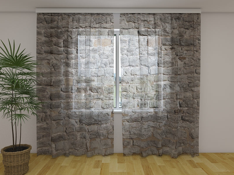 Mur de briques de château de rideau de photo